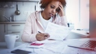mortage debt bills woman stress concern